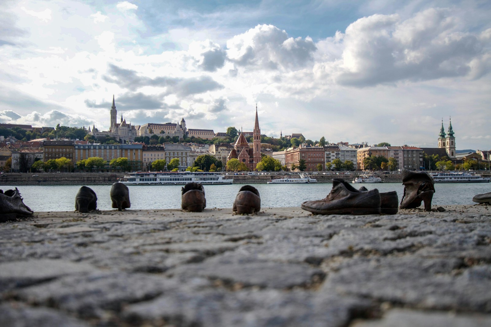 Jewish Budapest a group of shoes that are sitting on the ground