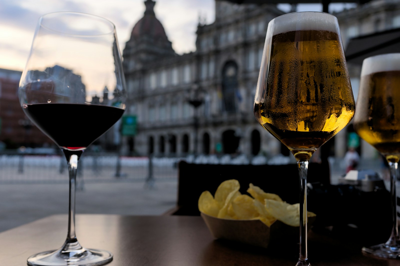 Coruña Spain a couple of glasses of wine sitting on top of a table