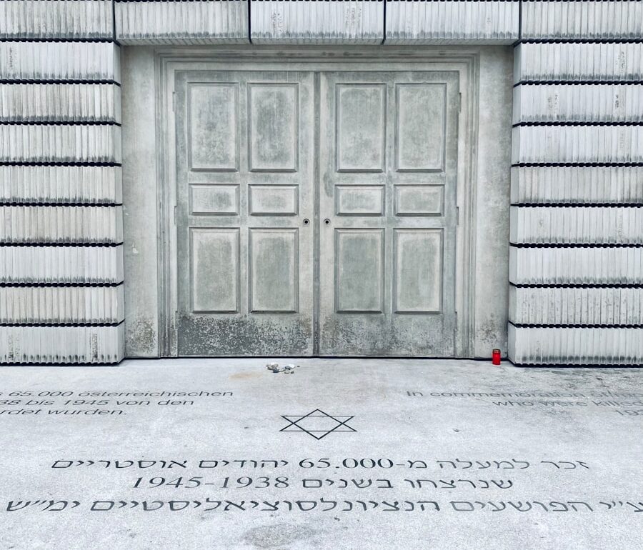Jewish Vienna grey wooden door on grey brick wall