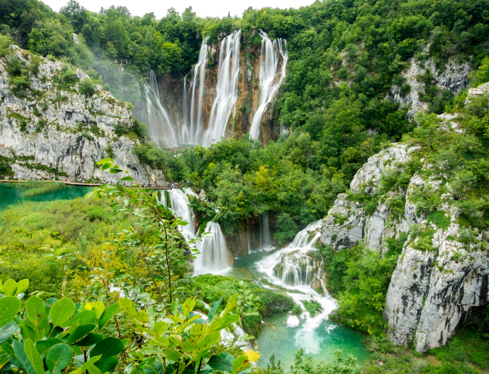Plitvice waterfalls in the middle of green trees