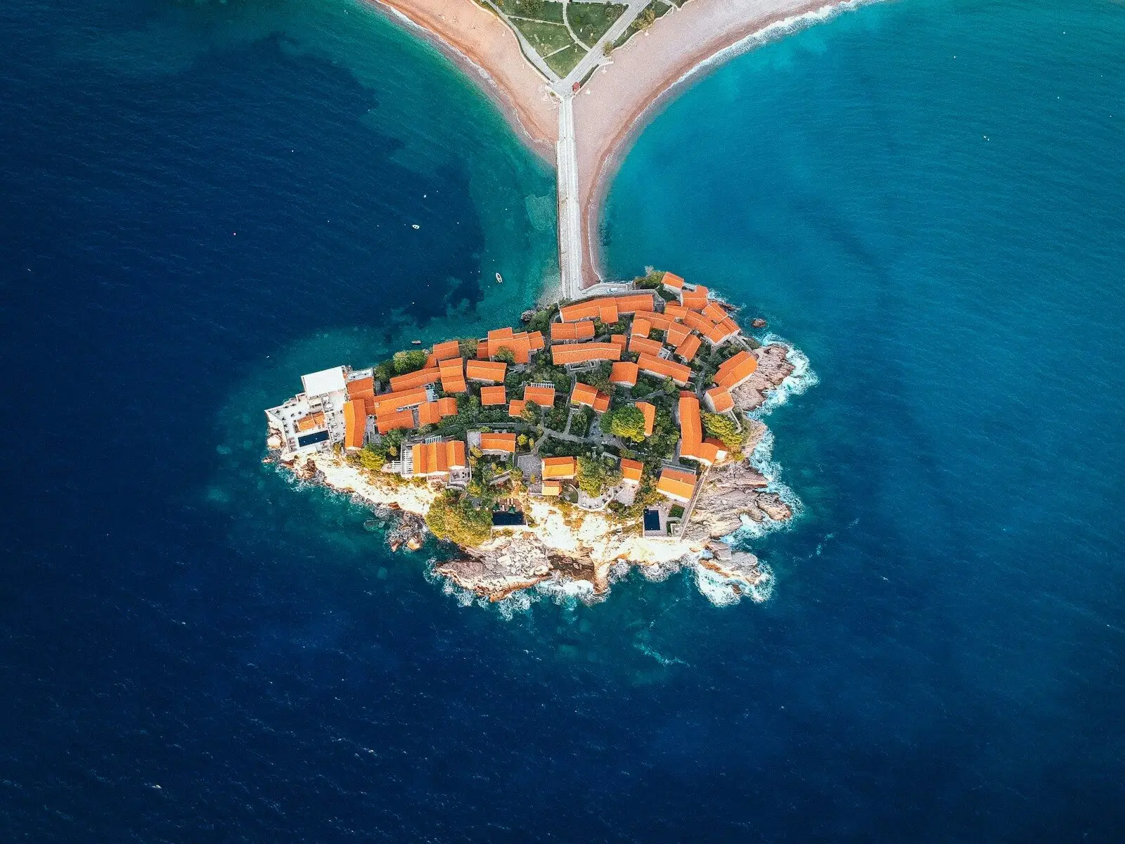 Montenegro aerial view of city buildings near body of water during daytime