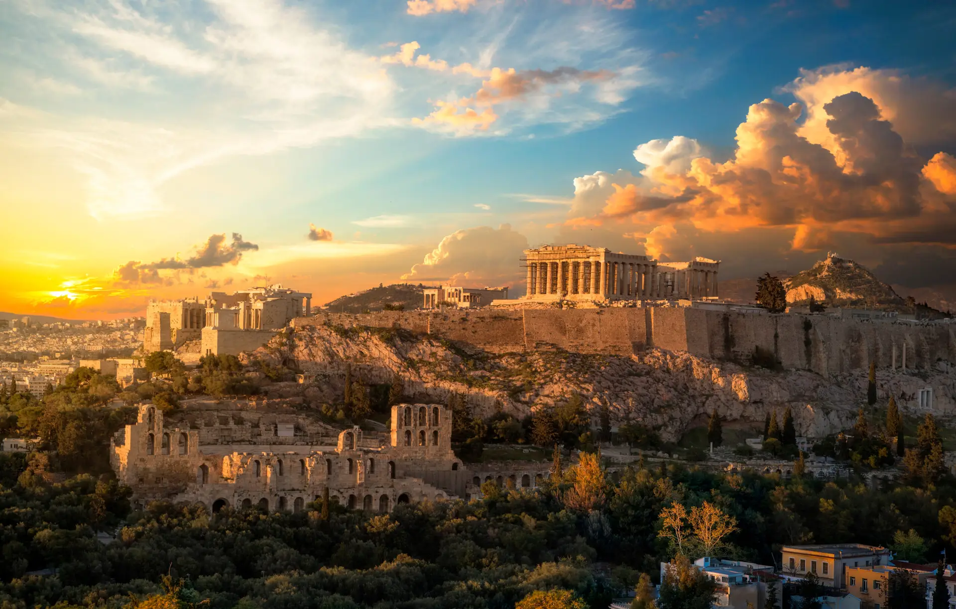 Athens-Acropolis of Athens at sunset with a beautiful dramatic sky